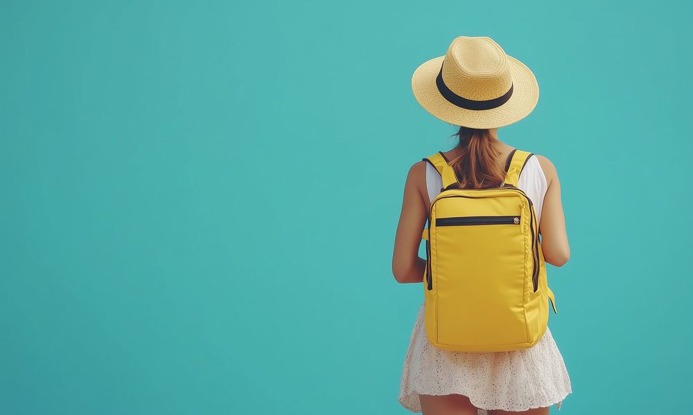 teenager ready for summer vacation isolated on a color background